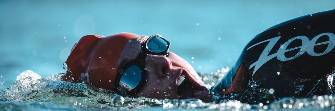 person swimming during daytime